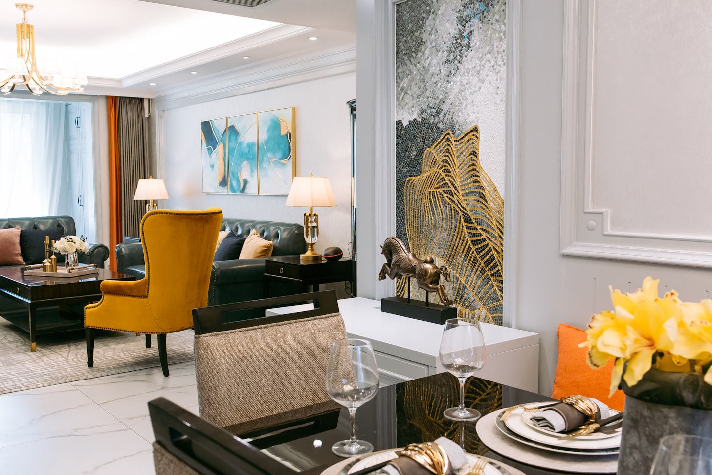 Elegant living and dining room with curated furniture and art.